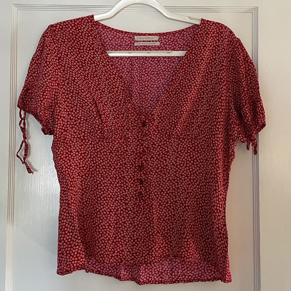 Red floral button up blouse with tied sleeves